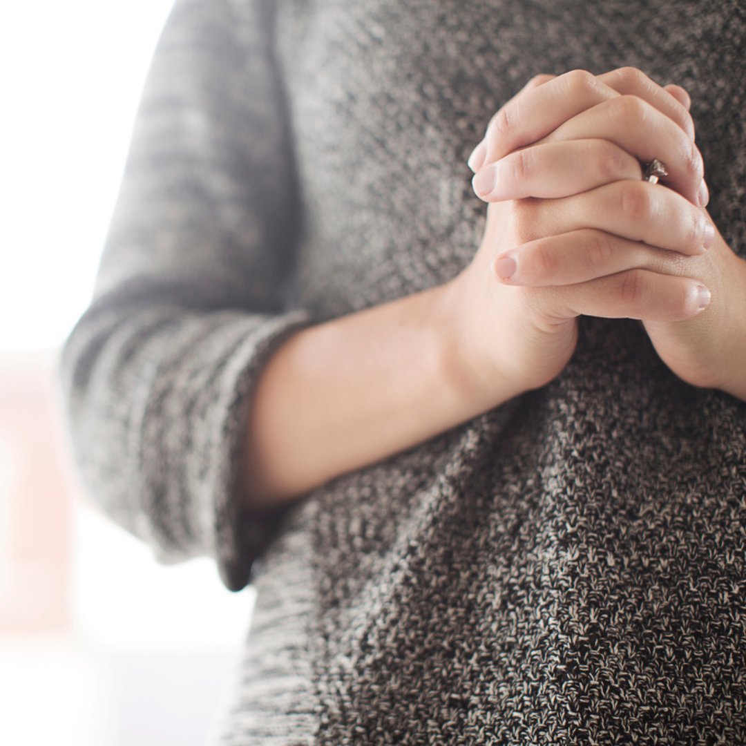 Woman Gray Sweater Praying Hands