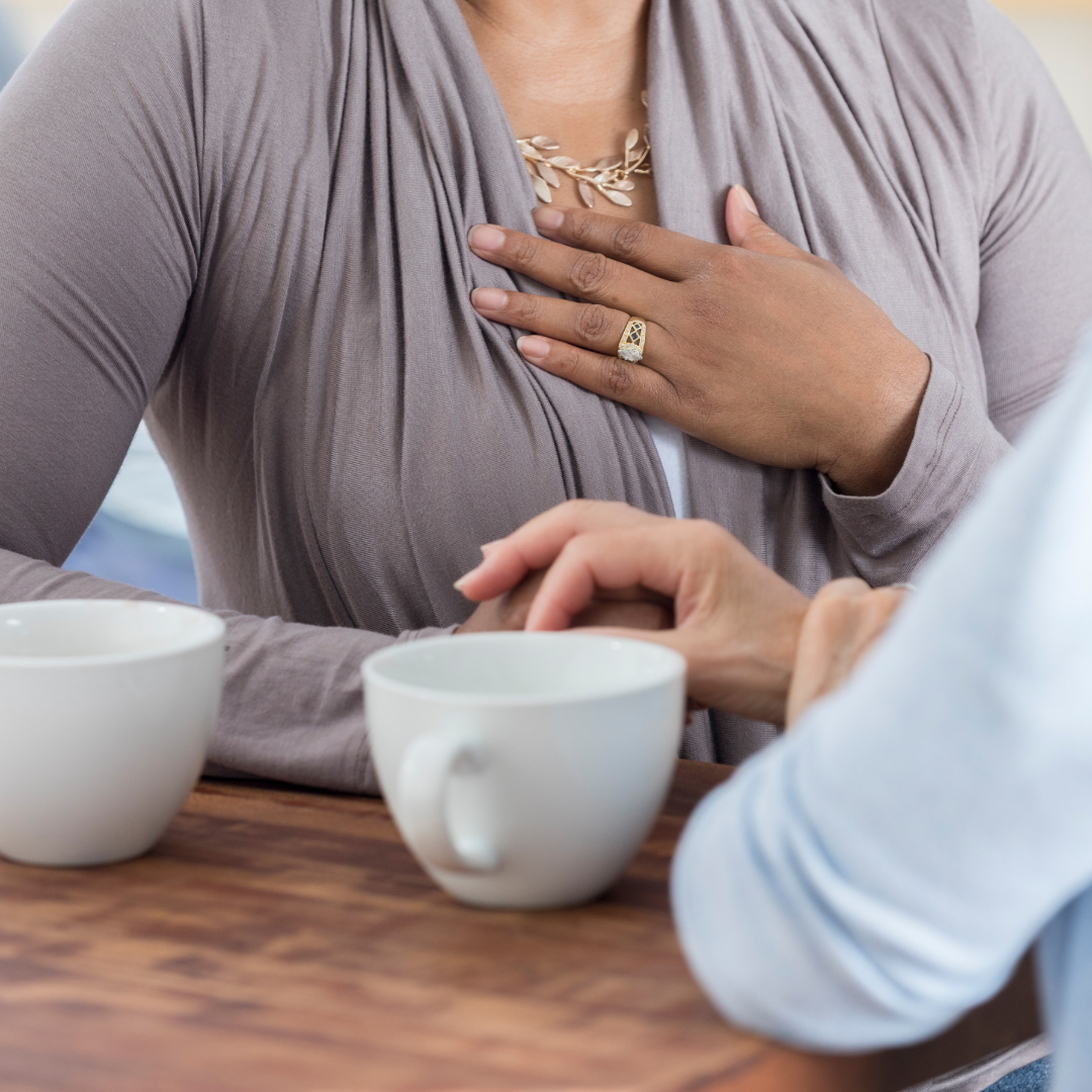 Women Having a Conversation and Coffee